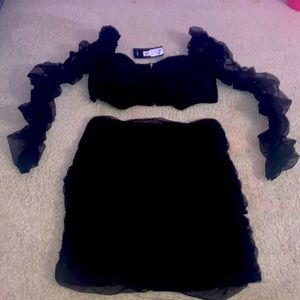 This is the “Fifteen Minutes Of Fame Mesh Skirt Set”